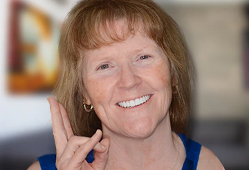 patient with dental implant fixed bridges