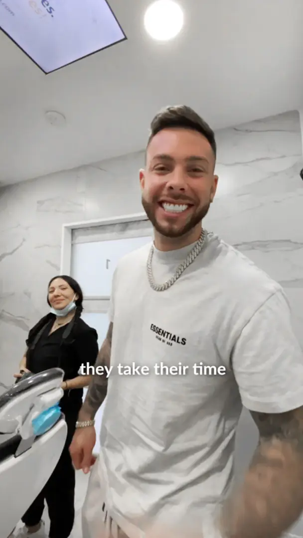 smiling for his dental work in cancun
