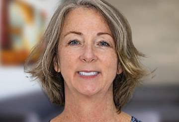 woman with 3 on 6 dental implants in mexico