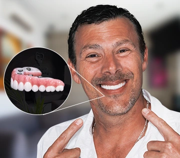 patient with a full set of emax dental crowns