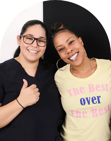 female patient seeing her final teeth restoration after her root canal therapy in Cancun Mexico
