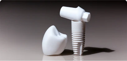 Dental crown, implant, and abutment made with zirconia, highlighting its aesthetics.