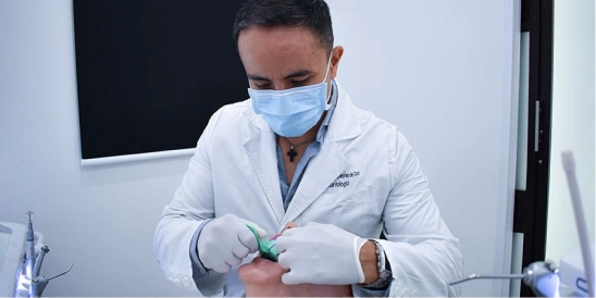 dental specialist performing an oral check-up 